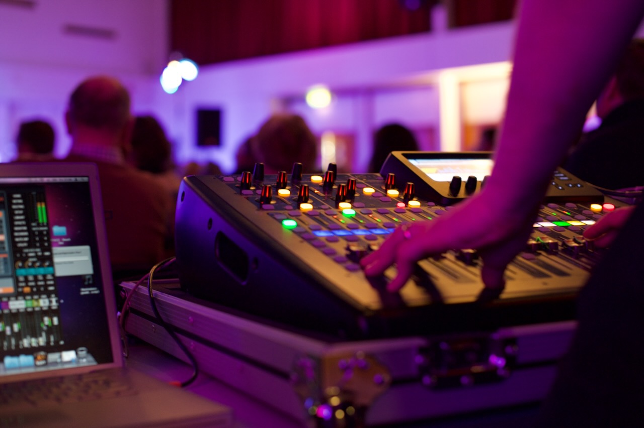 Mixing desk and control screens during a Roots of Jazz event