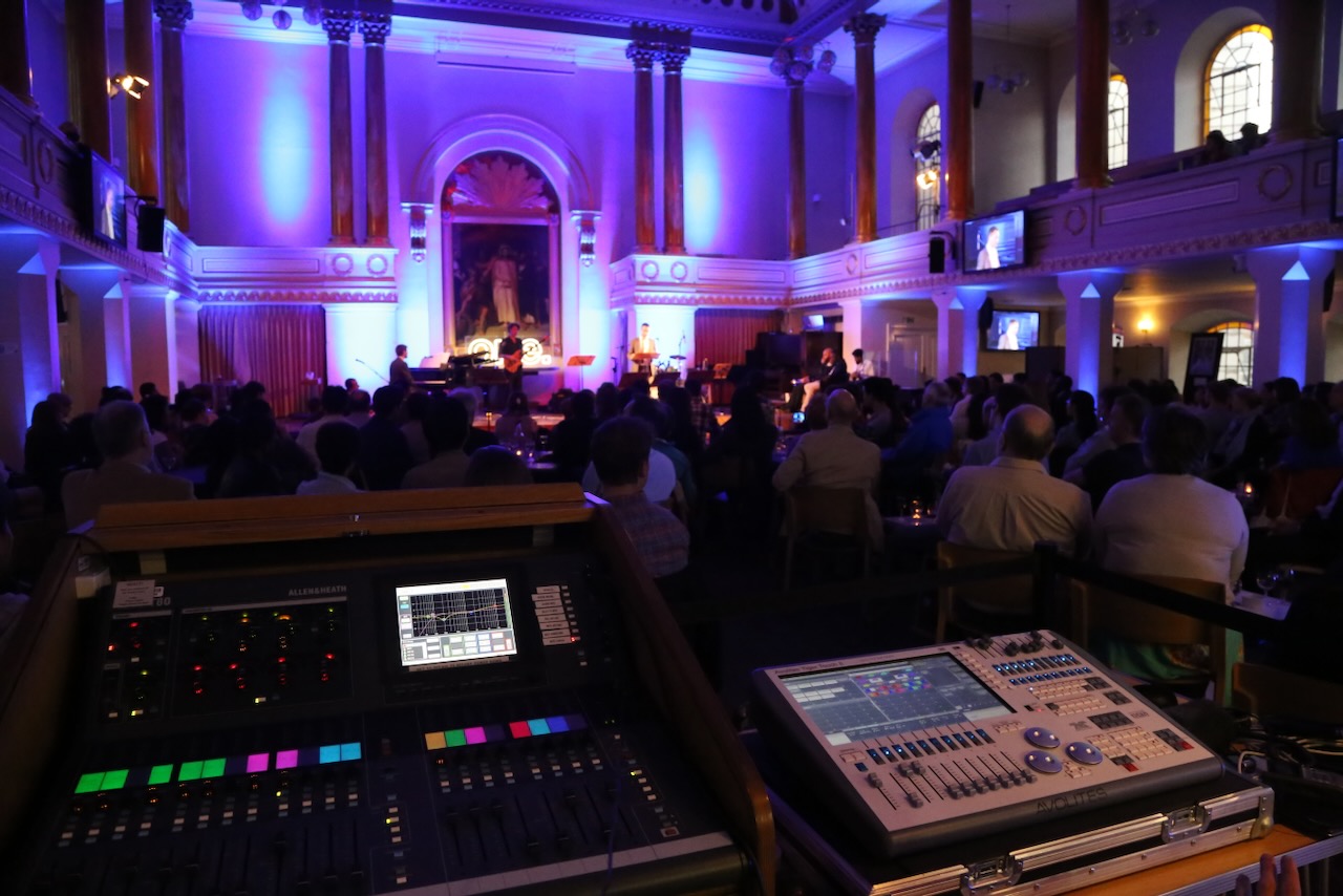 Sound and lighting control position behind the audience in a church venue